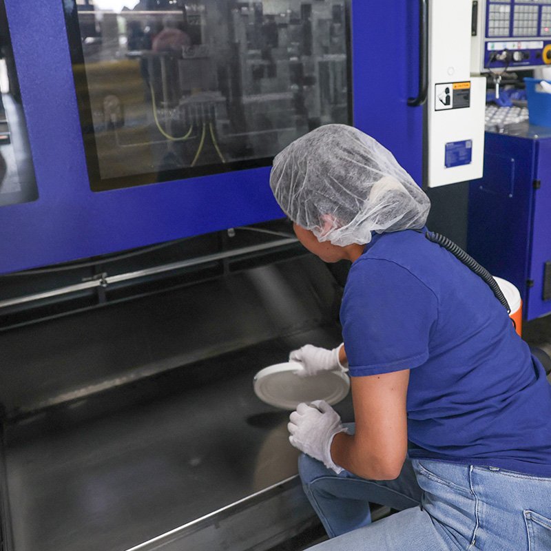 woman working at machine